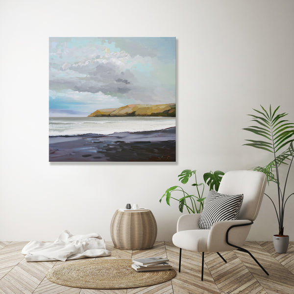Black Sand Beach Under A Cloudy Sky *25% Off at checkout